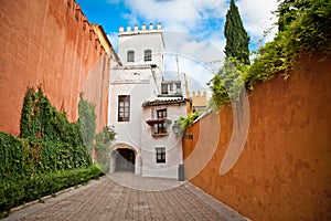 Medieval passageway in old part of Seville , Spain.