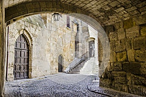 Medieval passageways in the village of Narbonne photo