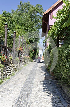 Medieval paved street in Sighisoara, Transylvania