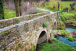 Medieval Pilgrim Bridge Puente outside the Town of Sarria in Galicia, on Way of St James Jakobsweg Camino de Santiago Pilgrimage photo