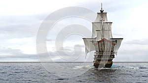 A medieval pirate ship sailing on a vast blue ocean. Concept of sea adventures in the middle ages. 3D Rendering