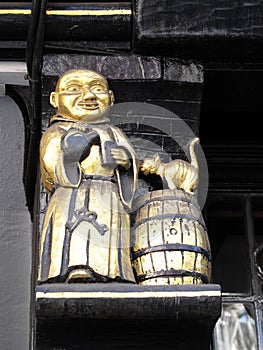 Medieval Pub Sign Showing A Monk Drinking Ale