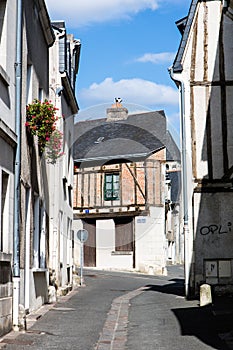 Medieval quiet street. Rue Jean Jacques Rousseau, Chinon, France photo