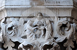 Medieval relief from Doge`s Palace, Saint Mark Square, Venice, Italy