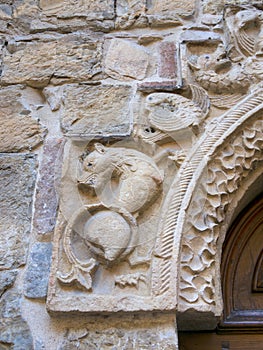 Medieval religious, Christian art. Outside Church of Saint Mary, Santa Maria Assunta in Fornovo, Italy.