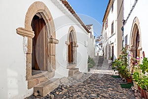Medieval Sephardic Synagogue (13th / 14th century) in the left in Castelo de Vide photo