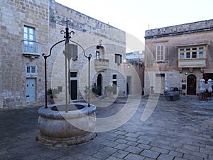 Medieval square with well in Mdina Malta