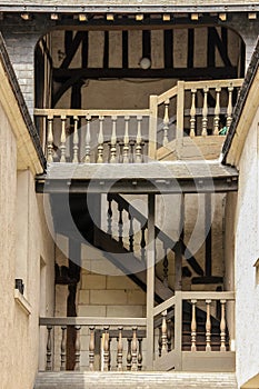 Medieval stairway and balcony. Tours. France