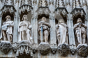 Group of statues from medieval facade on Grand Place in Brussels Belgium