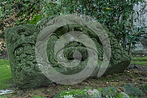 Medieval stone figures in a monster park in Bomarzo in Lazio, Italy