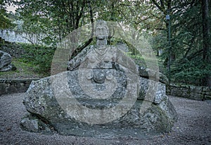 Medieval stone figures in a monster park in Bomarzo in Lazio, Italy