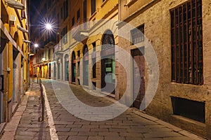 Medieval street at night in Milan, Lombardia, Italy