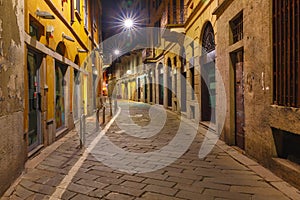 Medieval street at night in Milan, Lombardia, Italy