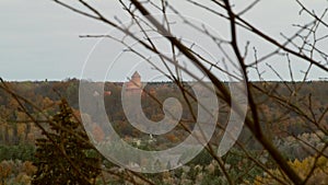 Medieval Turaida Castle Across the Valley Among Autumnal Trees.