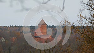 Medieval Turaida Castle Across the Valley Among Autumnal Trees.