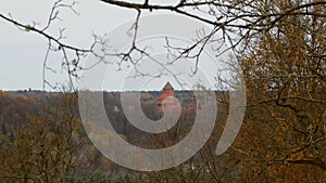 Medieval Turaida Castle Across the Valley Among Autumnal Trees.