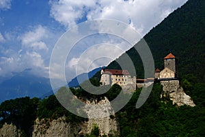 Medieval Tyrol Castle standing on the hill in Tirolo, Italy