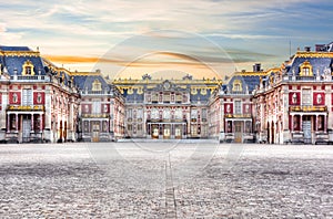 Medieval Versailles palace outside Paris at sunset, France