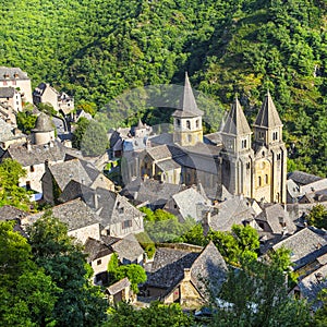 Medieval village of Conques and Sainte-Foy Abbey , France photo