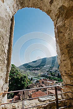 Medieval village of Dolceacqua, arch view perspective during daytime, Italy