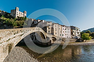 Medieval village of Dolceacqua, city and river landscape, old bridge, Italy