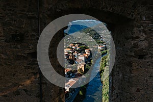 Medieval village of Dolceacqua, city and river landscape, old houses during daytime, Italy