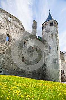 Medieval wall and tower with clock