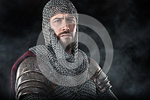 Medieval Warrior with chain mail armour and red Cloak