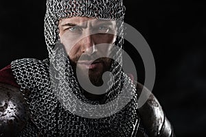 Medieval Warrior with chain mail armour and red Cloak