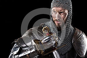 Medieval Warrior with chain mail armour and sword photo
