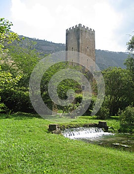 Medieval watchtower and gardens photo