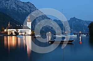 medieval water castle Schloss Ort Orth on lake Traunsee by night in Gmunden Austria