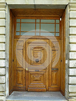 An medieval weathered stylish old wooden door