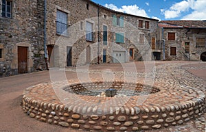 Medieval Well on old market town of Lachapelle