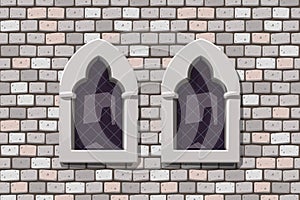 medieval windows on grey color stone wall