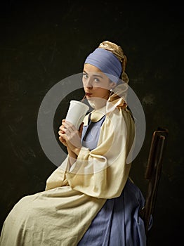 Medieval Woman in Historical Costume Wearing Corset Dress and Bonnet.