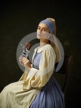 Medieval Woman in Historical Costume Wearing Corset Dress and Bonnet.