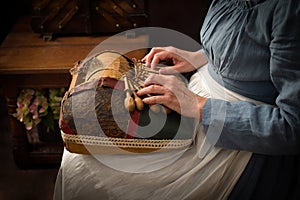 Medieval woman making lace