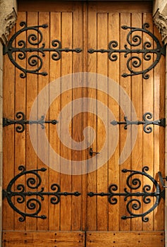 Medieval wood door, wrought-iron details