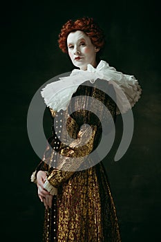 Medieval young woman as a duchess photo