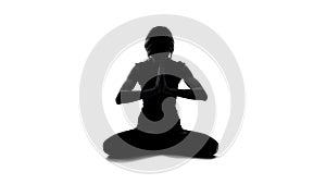 Meditating female silhouette sitting lotus pose, yoga mindfulness, spirituality