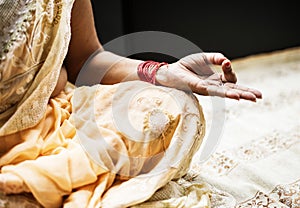 A meditating Indian woman closeup photo