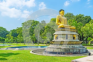 The Meditating Lord Buddha in Viharamahadevi park of Colombo photo