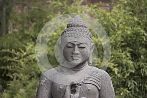 Meditating old buddha statue Buddha head, symbol for peace and