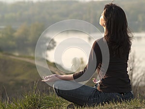 Meditating woman photo