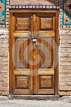 Meditation chamber for Sufis - artistically carved wooden door from Orient Samarkand Uzbekistan photo