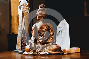 Meditation moment with buddha and cristals and incense photo