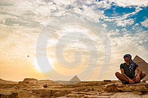 Meditation near the pyramids in Cairo, Egypt