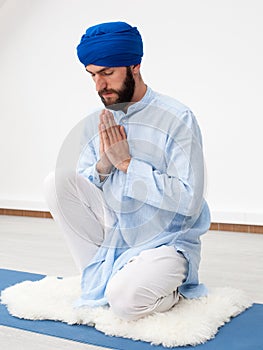 Meditation. Portrait of a young bearded man in a turban photo