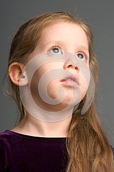 Meditation of redhead young girl with long hair